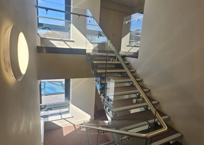 glass balustrade with stainless steel handrails