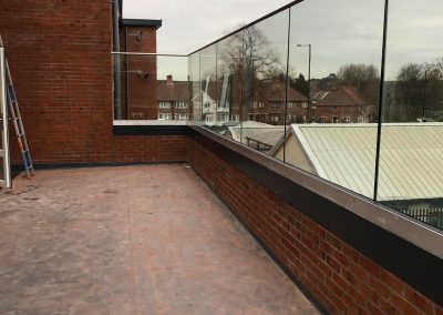glass balustrade with stainless steel handrails
