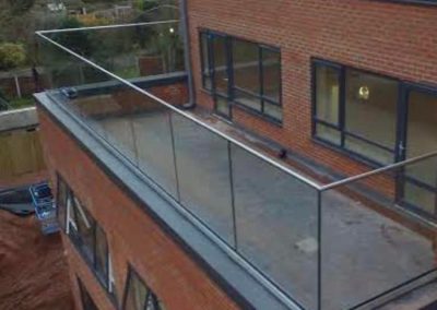glass balustrade with stainless steel handrails